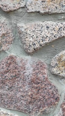 Taş dokusu. Dikey 16x9. Doğal taşın fotoğrafı. Doğal taş.