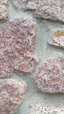 Taş dokusu. Dikey 16x9. Doğal taşın fotoğrafı. Doğal taş.