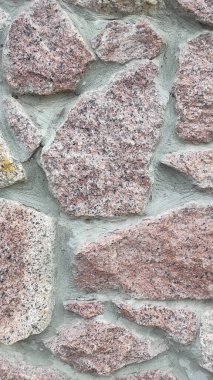 Taş dokusu. Dikey 16x9. Doğal taşın fotoğrafı. Doğal taş.