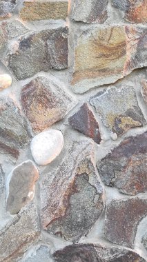 Taş dokusu. Dikey 16x9. Doğal taşın fotoğrafı. Doğal taş.