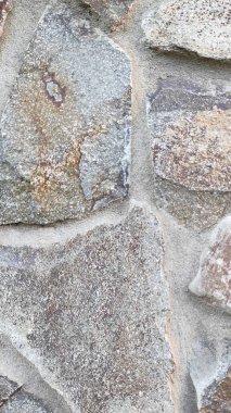 Taş dokusu. Dikey 16x9. Doğal taşın fotoğrafı. Doğal taş.