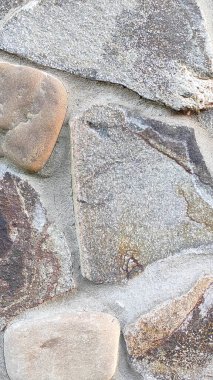 Taş dokusu. Dikey 16x9. Doğal taşın fotoğrafı. Doğal taş.