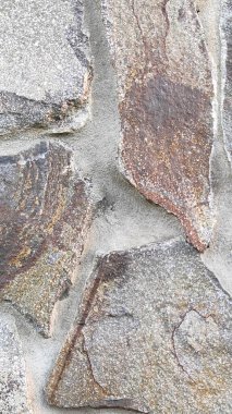 Taş dokusu. Dikey 16x9. Doğal taşın fotoğrafı. Doğal taş.