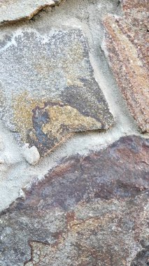 Taş dokusu. Dikey 16x9. Doğal taşın fotoğrafı. Doğal taş.