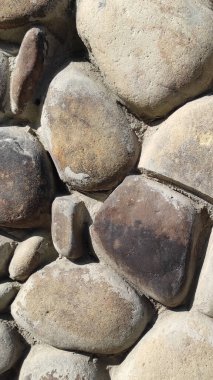 Taş dokusu. Dikey 16x9. Doğal taşın fotoğrafı. Doğal taş.