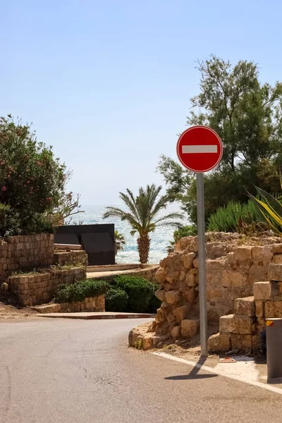 View of road with DO NOT ENTER sign at sea resort
