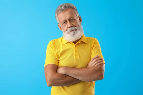 Senior Bearded Man Yellow Shirt Blue Background — Stock Photo, Image