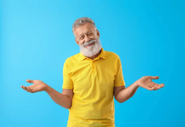 Senior Bearded Man Yellow Shirt Blue Background — Stock Photo, Image