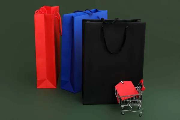 Shopping Cart Price Tag Bags Green Background Black Friday Sale — Stock Photo, Image