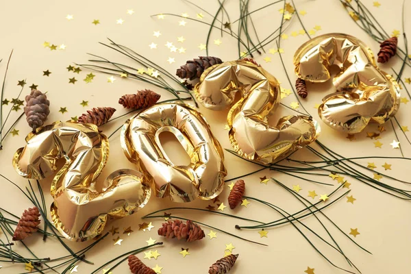 Figure 2023 Made Balloons Confetti Fir Branches Pine Cones Beige — Stock Photo, Image
