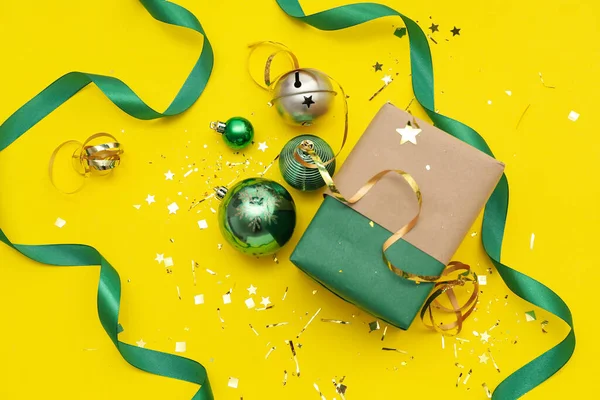 Composition Christmas Gift Balls Ribbon Yellow Background — Stock Photo, Image