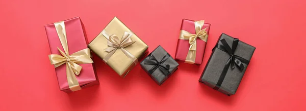 Different Gift Boxes Red Background Top View — Stock Photo, Image