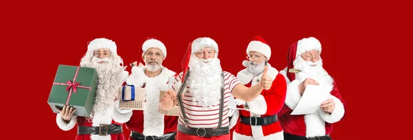 Many Santa Clauses Red Background — Stock Photo, Image