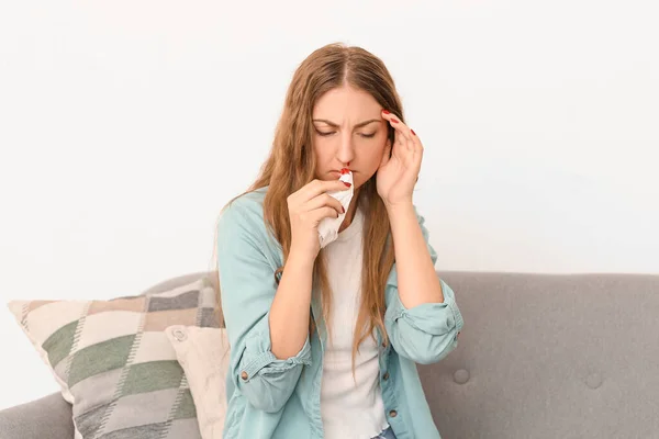 Young Woman Wiping Nosebleed Tissue Home — Stock Photo, Image