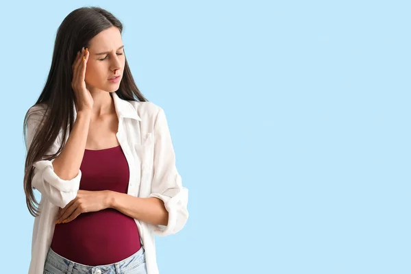 Young Pregnant Woman Nosebleed Blue Background — Stock Photo, Image