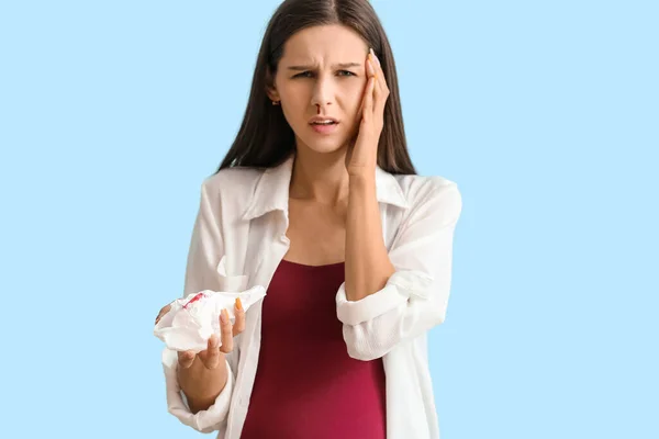 Young Pregnant Woman Nosebleed Tissue Blue Background — Stock Photo, Image