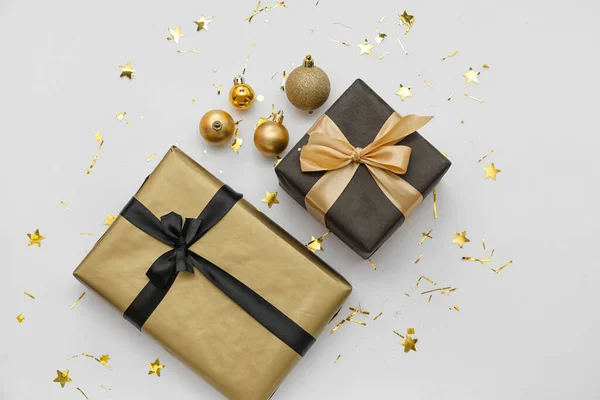Beautiful Christmas Gifts Balls Confetti Grey Background — Stock Photo, Image