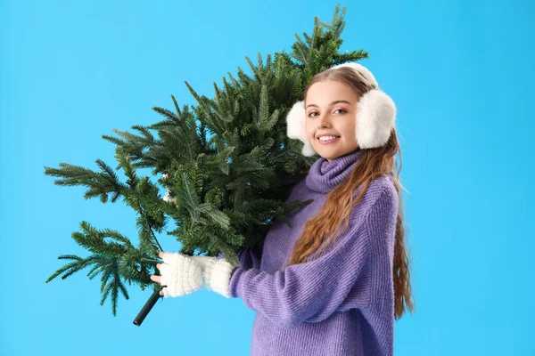 Young Woman Christmas Tree Blue Background — Stock Photo, Image
