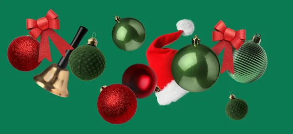 Christmas Balls Santa Hat Jingle Bell Green Background — Stock Photo, Image