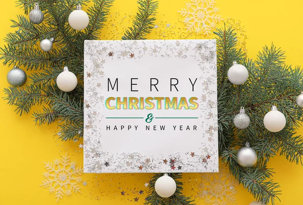 Greeting Card Christmas Balls Fir Branches Yellow Background — Stock Photo, Image