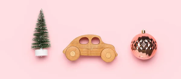 Toy Car Small Christmas Tree Ball Pink Background — Stock Photo, Image