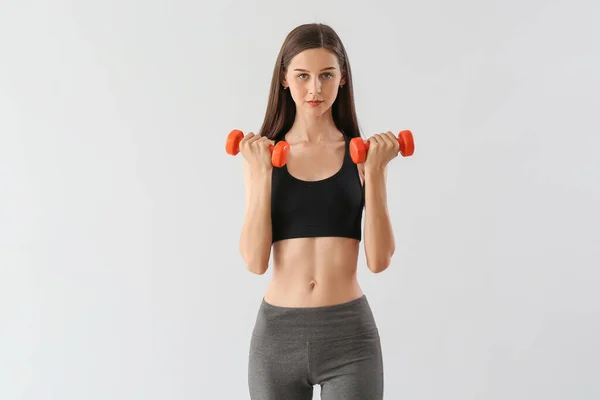 Sporty Young Woman Dumbbells Light Background — 스톡 사진
