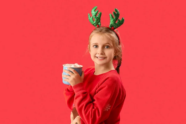 Happy Little Girl Reindeer Horns Cup Cocoa Red Background — Stock Photo, Image