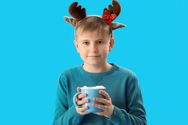 Happy Little Boy Reindeer Horns Cup Cocoa Blue Background — Stock Photo, Image