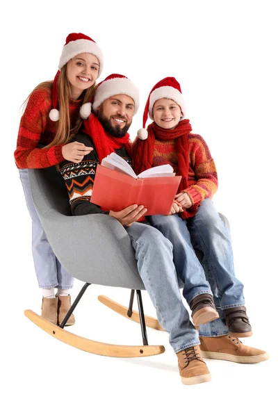 Happy Parents Little Son Santa Hats Reading Book White Background — Stock Photo, Image