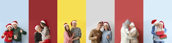 Paar Weihnachtsmützen Auf Buntem Hintergrund — Stockfoto