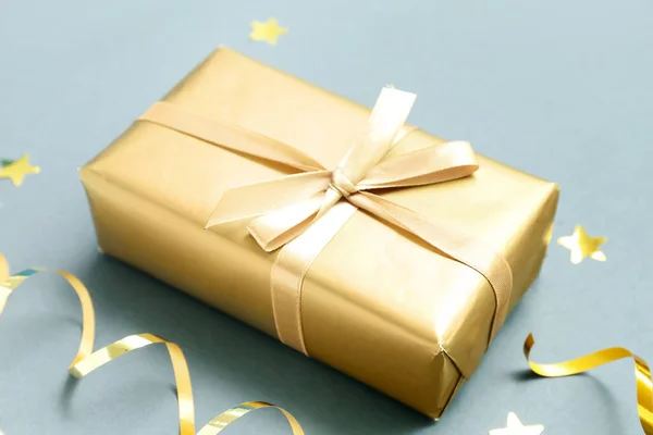 Beautiful Christmas Gift Confetti Serpentine Grey Background Closeup — Stock Photo, Image