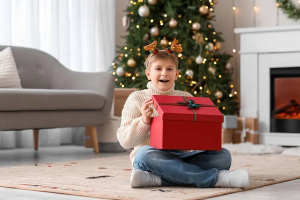 Little Boy Reindeer Horns Opening Christmas Gift Home — Stock Photo, Image