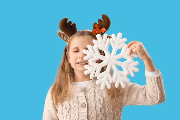 Little Girl Reindeer Horns Snowflake Blue Background — Stock Photo, Image