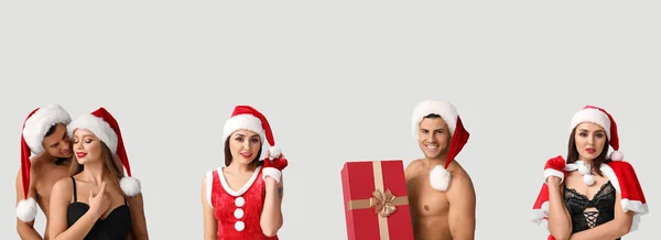Group of sexy young people on light background. Christmas celebration