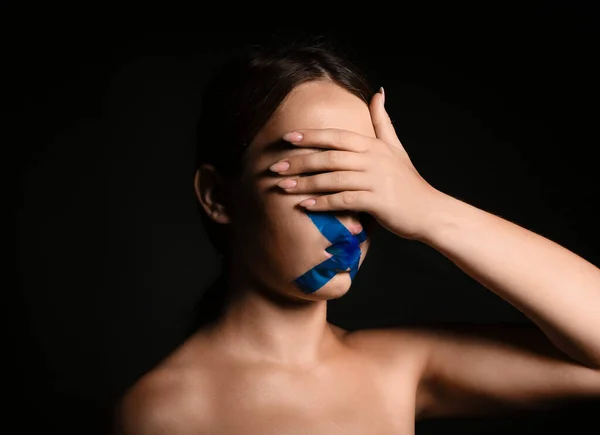 Young Woman Taped Mouth Covering Eyes Dark Background Censorship Concept — Stock Photo, Image