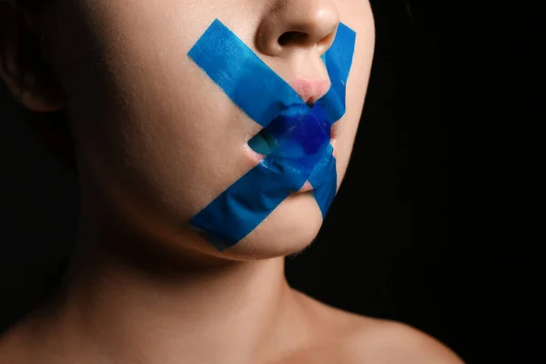 Young Woman Taped Mouth Dark Background Closeup Censorship Concept — Stock Photo, Image