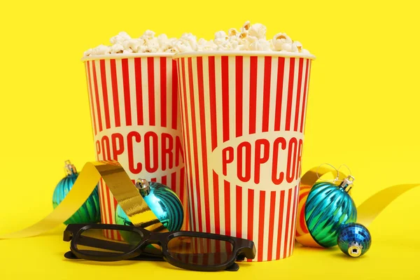 Buckets Popcorn Glasses Ribbon Christmas Balls Yellow Background — Stock Photo, Image