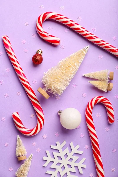 Composition Tasty Candy Canes Christmas Decorations Confetti Lilac Background — Stock Photo, Image