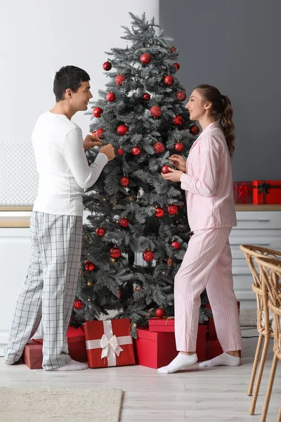 Loving Couple Decorating Christmas Tree Kitchen — Stock Photo, Image