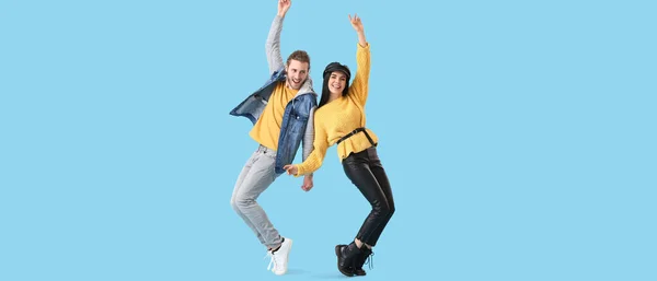 Happy Dancing Young Couple Light Blue Background — Stock Photo, Image