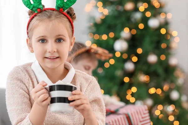 Little Girl Reindeer Horns Cup Cocoa Home Christmas Eve — Stock Photo, Image