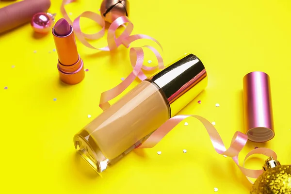 Makeup Products Christmas Decor Yellow Background Closeup — Stock Photo, Image