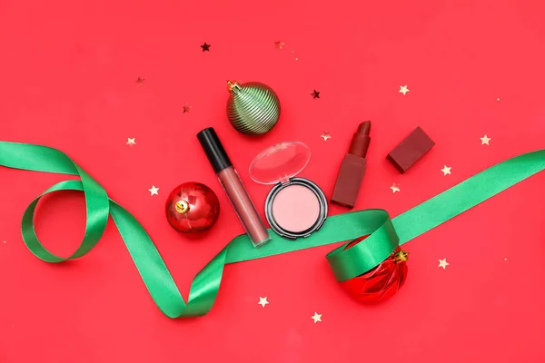 Makeup Products Christmas Balls Ribbon Red Background — Stock Photo, Image
