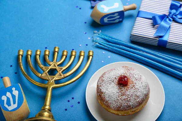 Plate Tasty Doughnut Menorah Dreidels Candles Hanukkah Celebration Blue Background — Stock Photo, Image