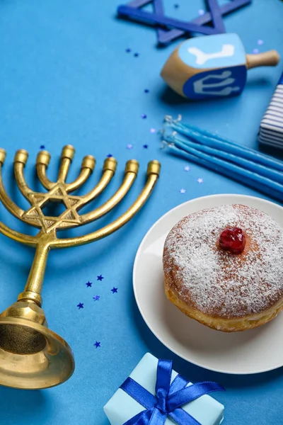 Plate Tasty Doughnut Menorah Candles Gift Hanukkah Celebration Blue Background — Stock Photo, Image