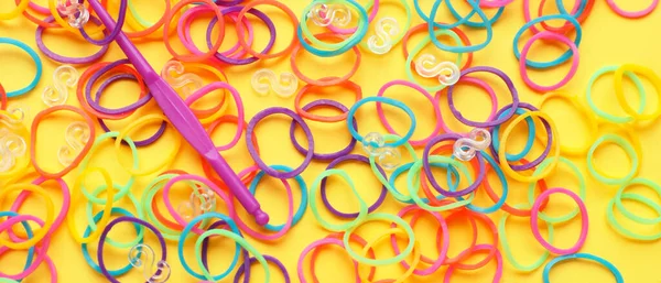 This is a photograph of Blue,Green,Purple,Orange,Pink and Yellow pipe  cleaners background Stock Photo