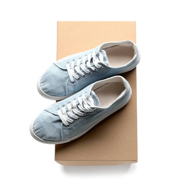 Cardboard Box Blue Sneakers White Background — Stock Photo, Image