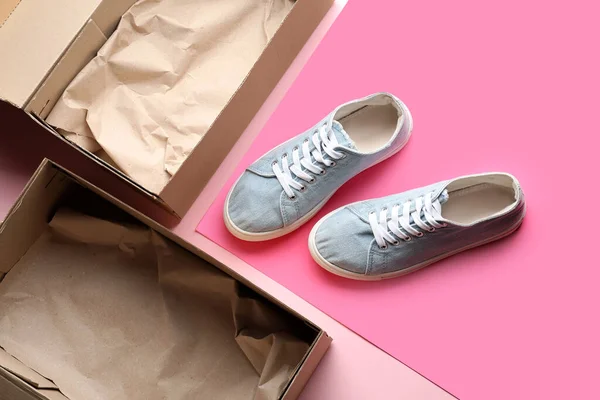 Cardboard Box Blue Sneakers Pink Background — Stock Photo, Image