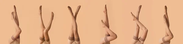 Ноги Багатьох Красивих Молодих Жінок Панчохах Бежевому Фоні — стокове фото
