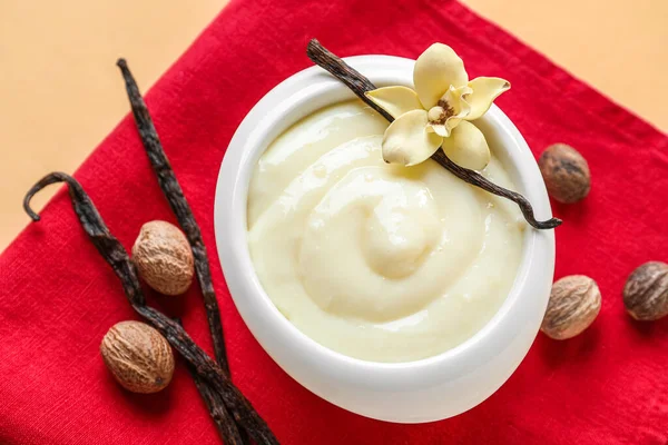 Napkin Bowl Tasty Pudding Vanilla Sticks Nuts Beige Background — Stock Photo, Image